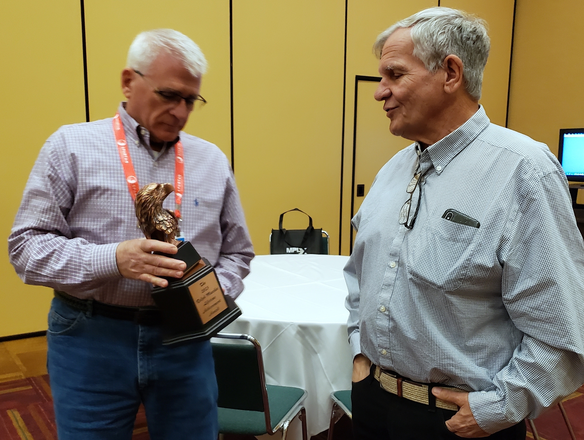 Bob Kendall, owner of COLE Publishing (right) talks with Jeff Rachlin, recipient of the Ralph Macchio Lifetime Achievement Award following the award presentation on Wednesday at the 2023 Water & Wastewater Equipment, Treatment & Transport Show.