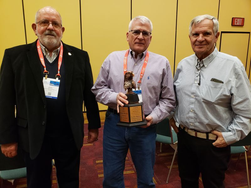 Jeff Rachlin (center) was named as the recipient of the Ralph Macchio Lifetime Achievement Award on Wednesday at the 2023 Water & Wastewater Equipment, Treatment & Transport Show. Pictured with Rachlin are Bruce Fox, left, with NAWT, and Bob Kendall, owner of COLE Publishing.